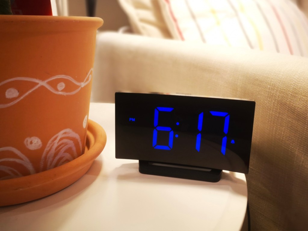 alarm clock on table in living room