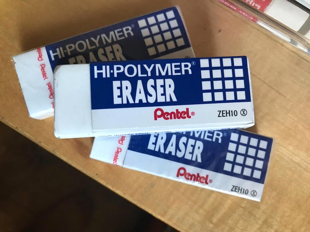 Pentel erasers on table 