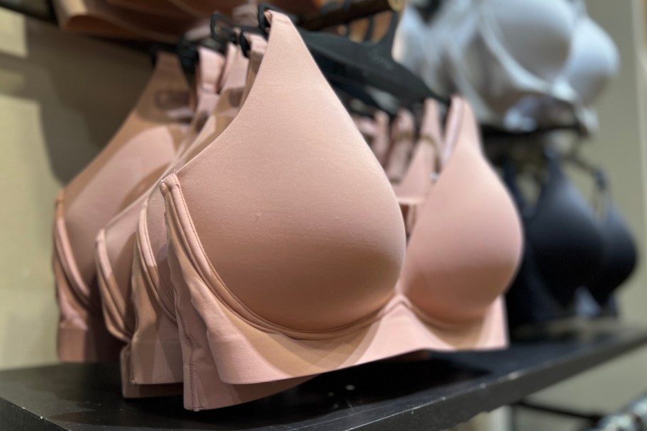 dusty rose bra on hanger