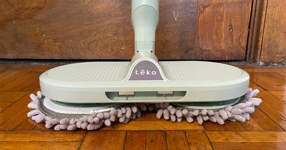 green teko hover mop on hardwood floor