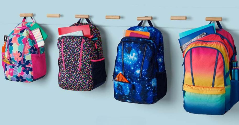 colorful Lands End Kids Backpacks hanging on a wall