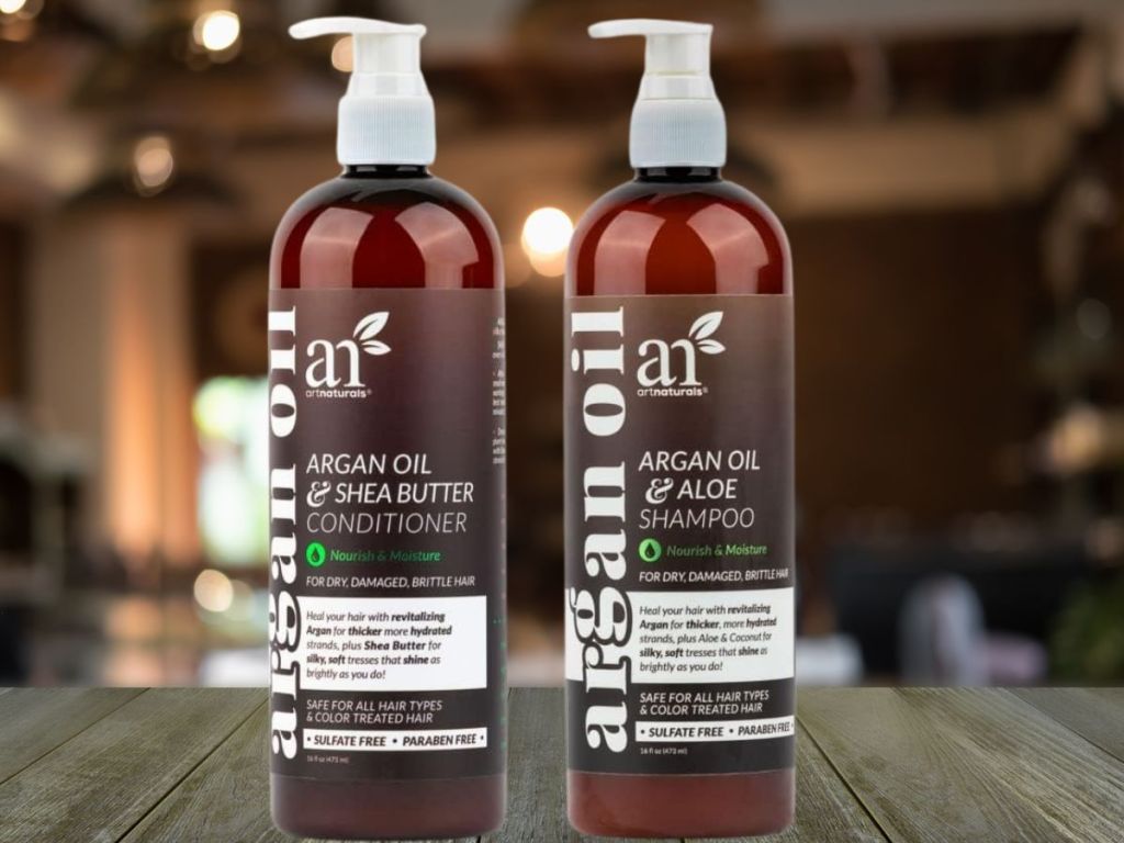 ArtNaturals Argan Oil Shampoo & Conditioner Set on wood surface