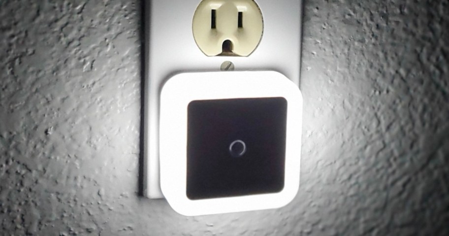 sujeet square nightlight plugged into wall outlet