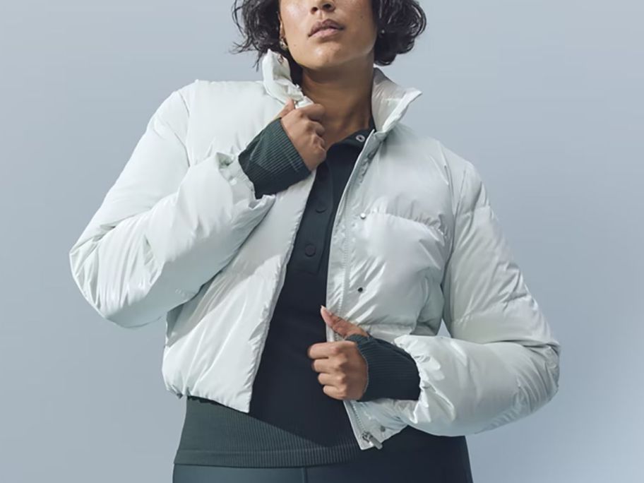 woman wearing Athleta Summit Cropped Shine Puffer