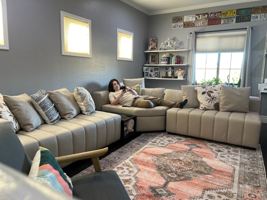 boy sitting on sectional couch