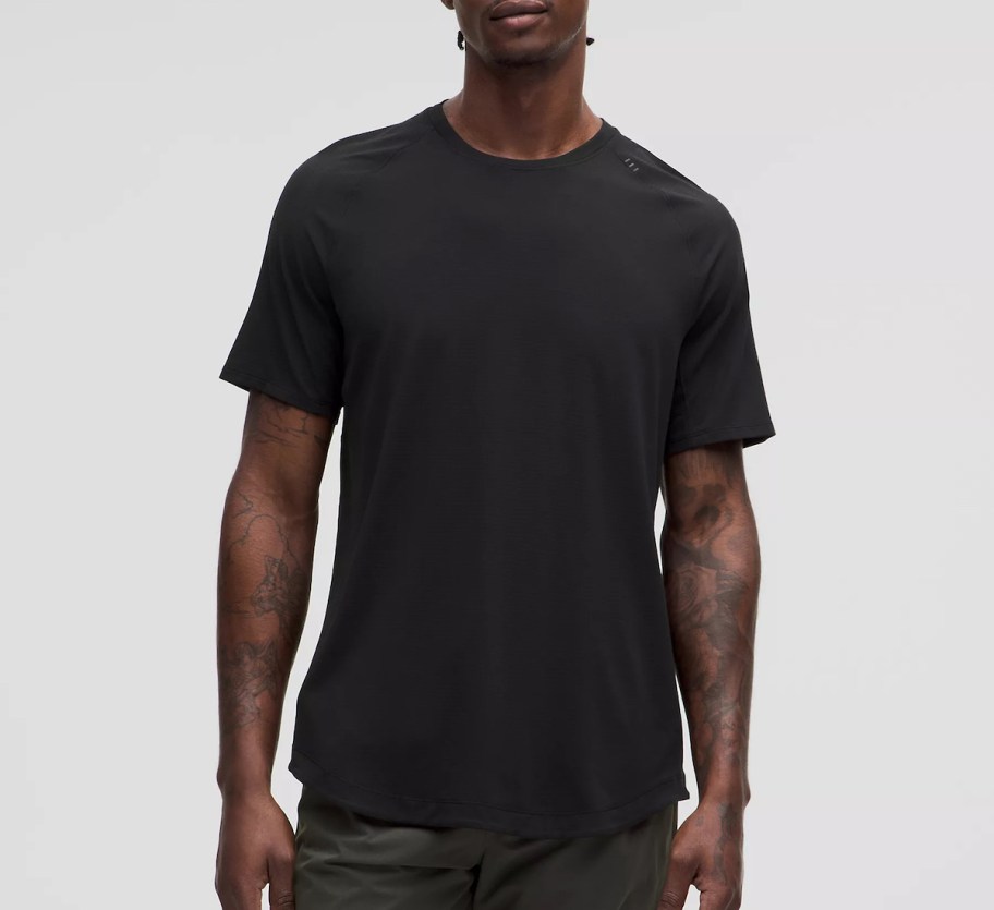 man modeling black t shirt