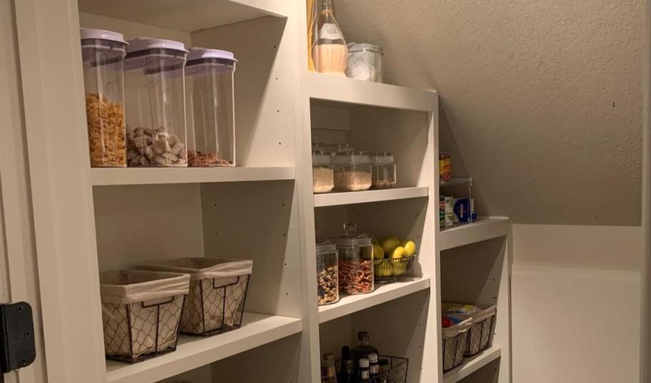 organized pantry with pop containers