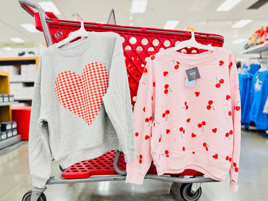 target women's valentine's day shirts hanging on cart