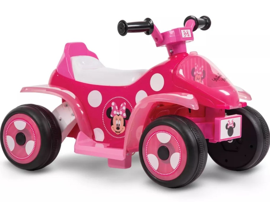 pink and white polka dot Minnie Mouse ride on car