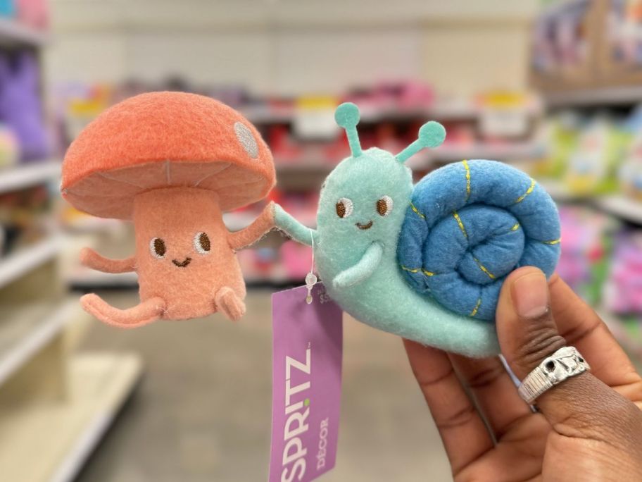 felt Mushroom & Snail Duo Figures in person's hand 