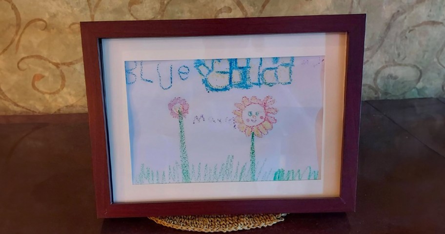 9.5x13 Kids Art Frame sitting on a table in a home