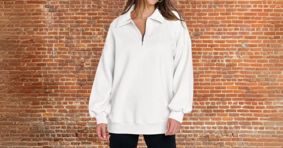 woman wearing Anrabess Women's Oversized Pullover w/ Quarter Zip in front of brick wall