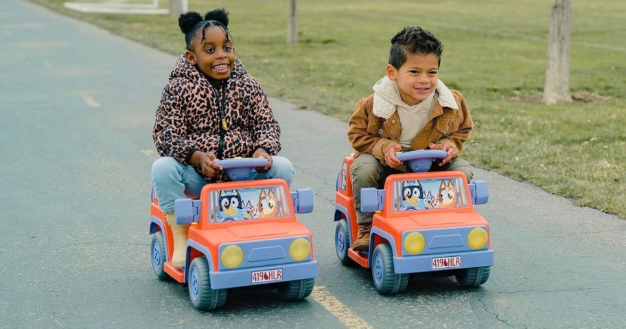 two kids on bluey ride on cars