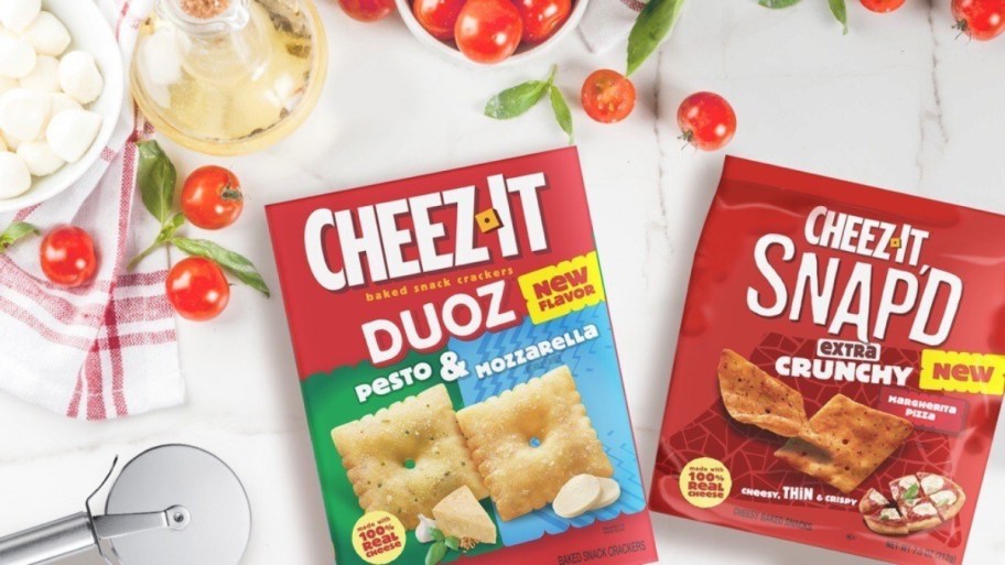 two Cheez-It containers on a white tablecloth