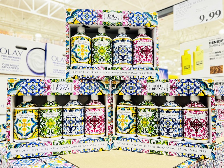 stacked 4-packs of hand soap in colorful bottles