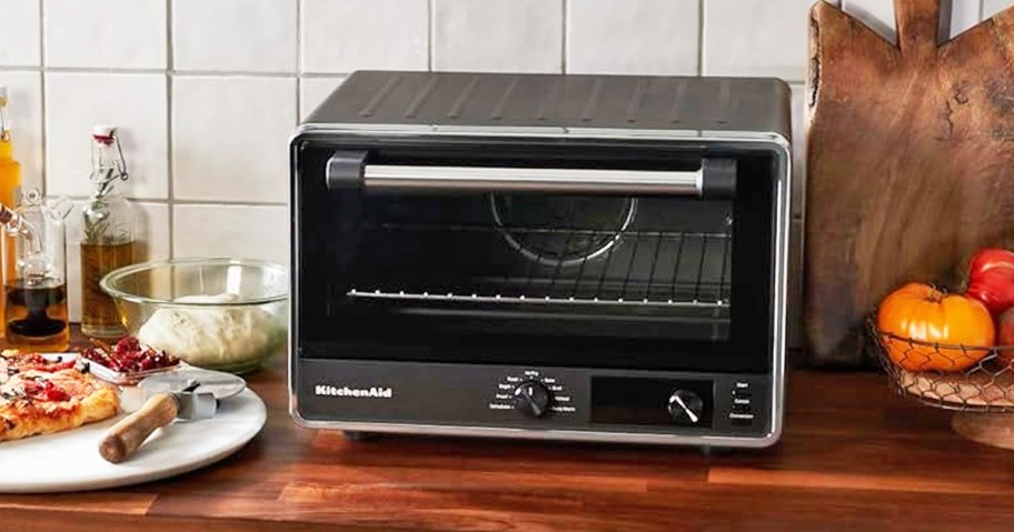 black and silver countertop oven on counter