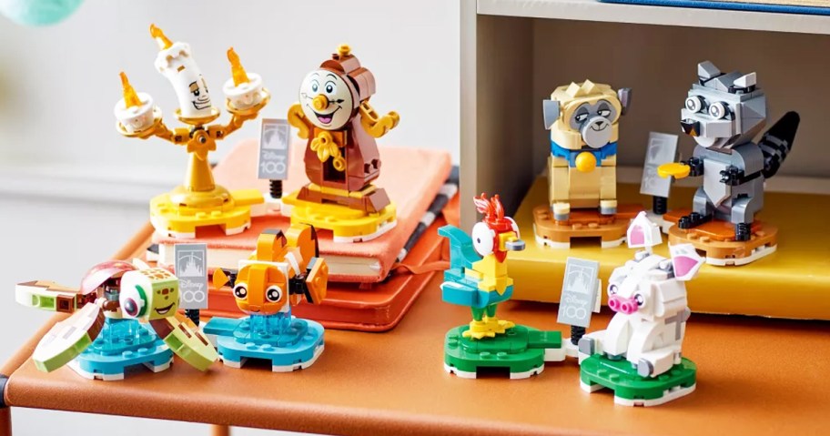 disney character lego figurines on wood table