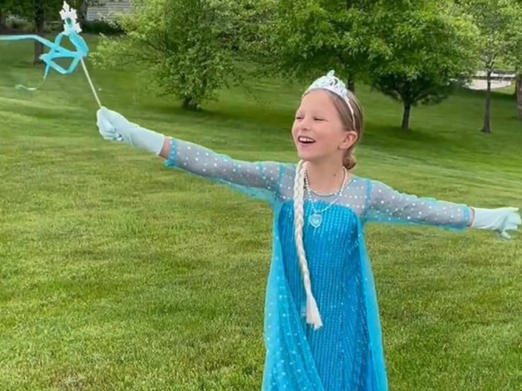 A little girl in a Princess Elsa Costume