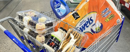 sam's club shopping cart full of grocery and household items