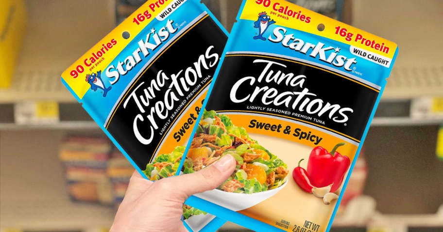 hand holding 2 packs of StarKist Tuna Creations