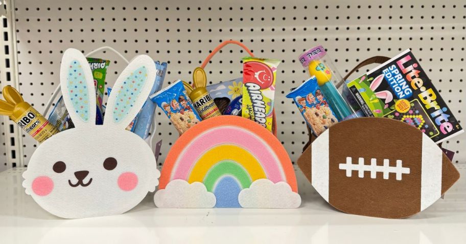 3 spritz felt easter baskets filled with easter goodies on a shelf at Target