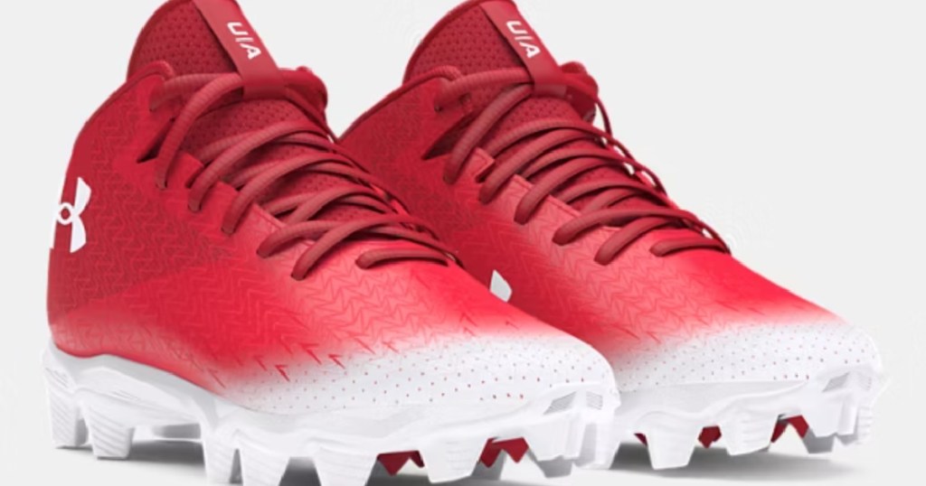 red pair of Under Armour Football Cleats