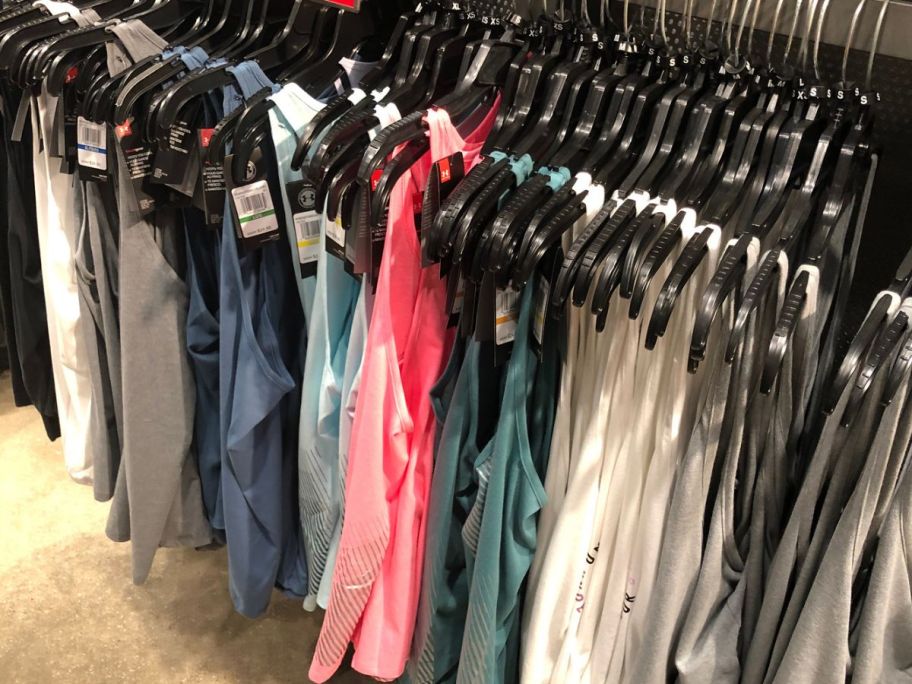 A rack of Under Armour Women's Tank Tops