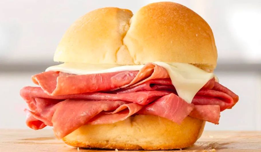 arbys roast beef slider on a butcher block