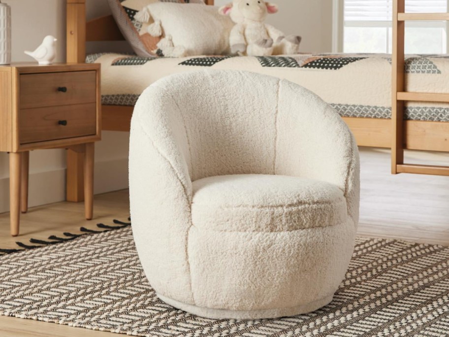 beige kids swivel chair displayed in kids room