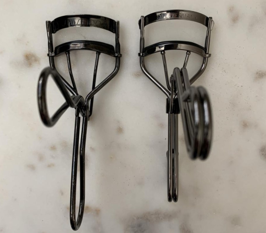 two tweezerman eyelash curlers side by side