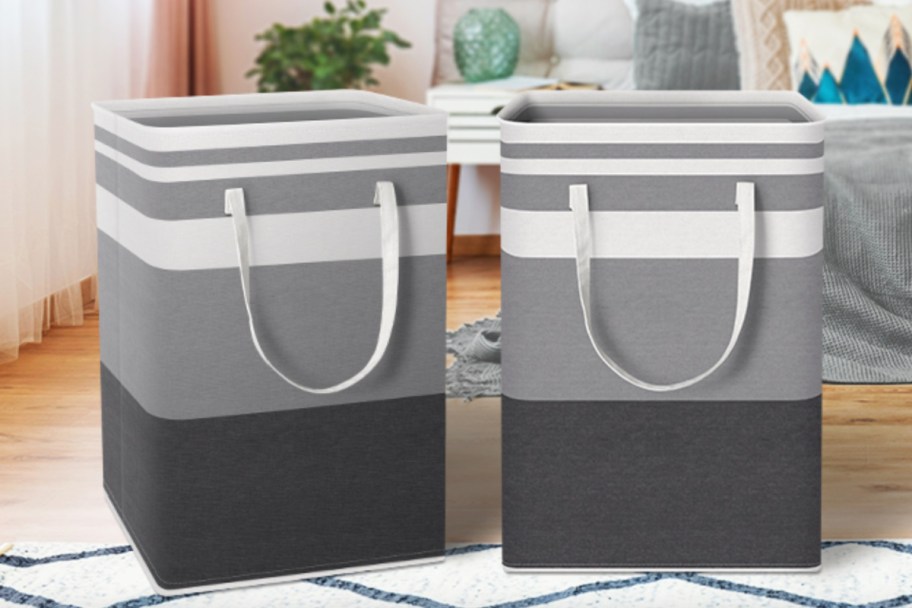 two grey stripe collapsible laundry baskets