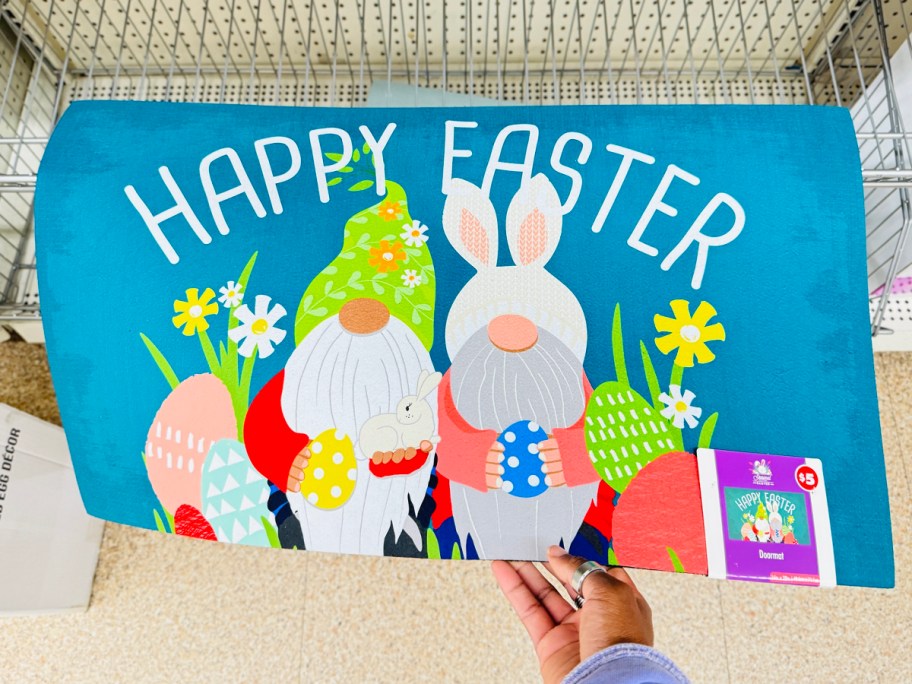 hand holding happy easter doormat 