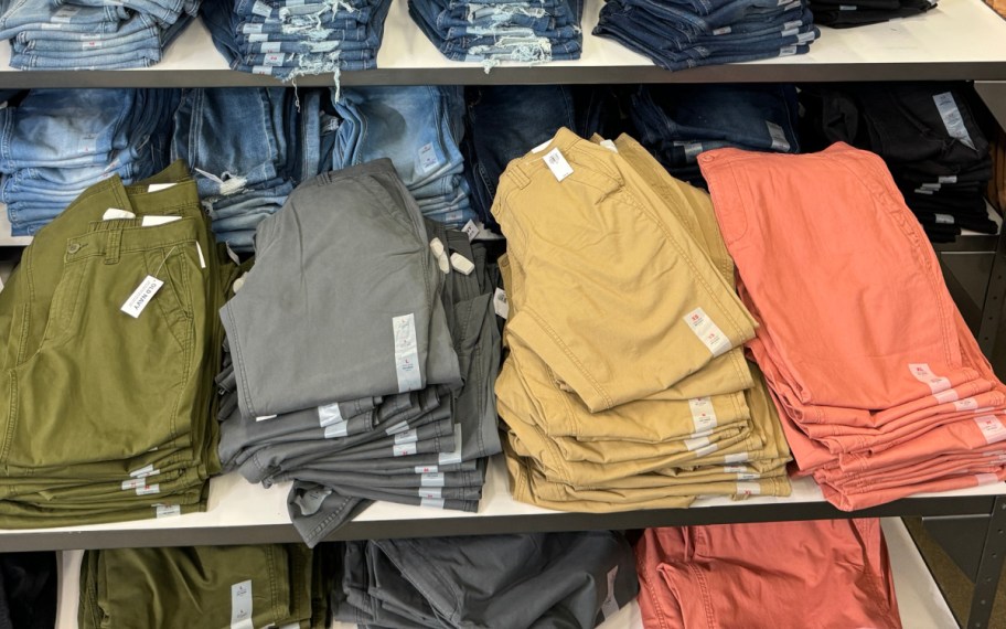 multi colored pants folded on table