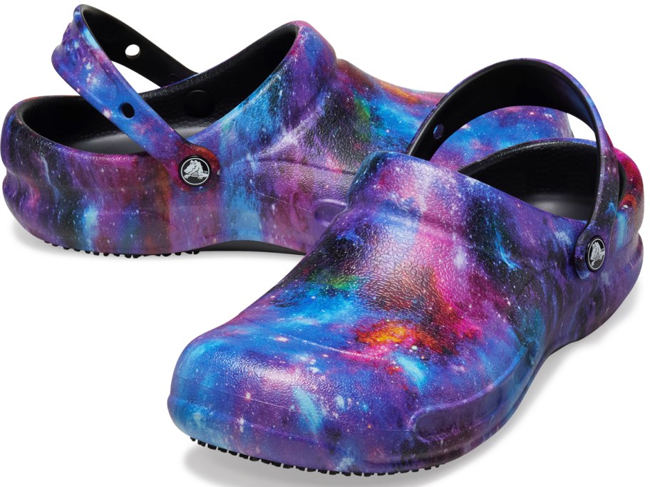 pair of galaxy print crocs clogs