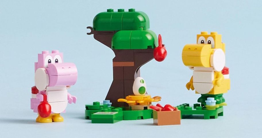 a closeup of a LEGO expnasion set featuring yoshi the purple hippo for super mario