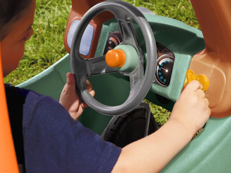 Interior view of the Little Tikes Dino Cozy Coupe