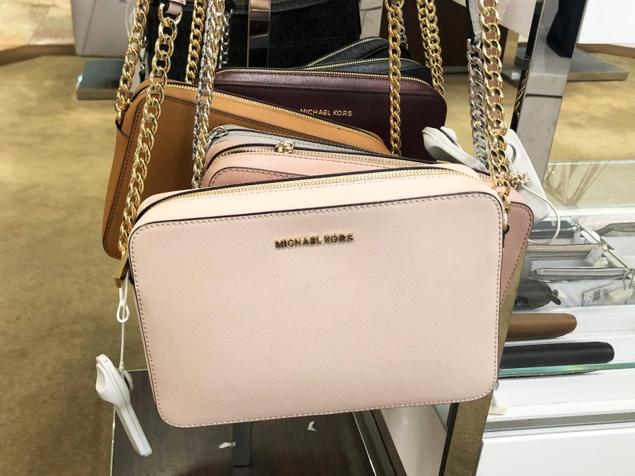 Michael Kors Crossbody Bags on display in store