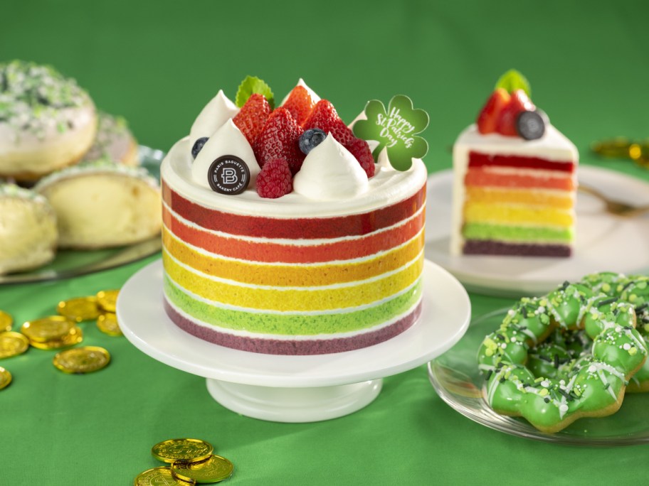 rainbow cake on green background