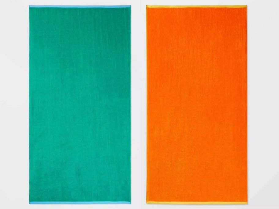 2 beach towels in green and orange