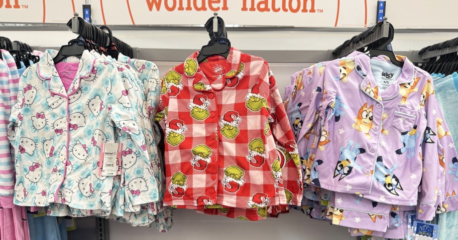 kids pajama sets on hangers on store display