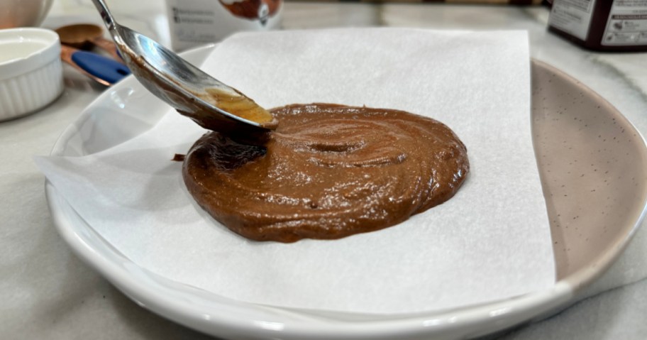 adding protein cookie dough to a cookie