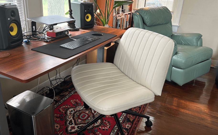 armless white office chair at onlineputer desk