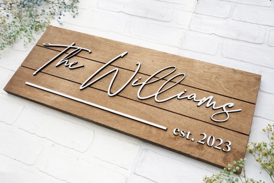 wooden family name sign