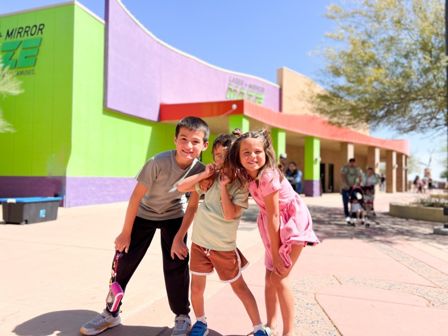 kids in front of laser maze building