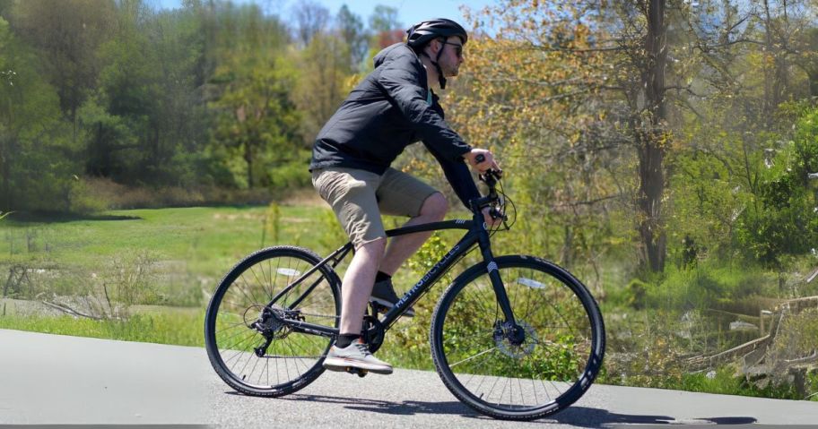 man riding kent bike