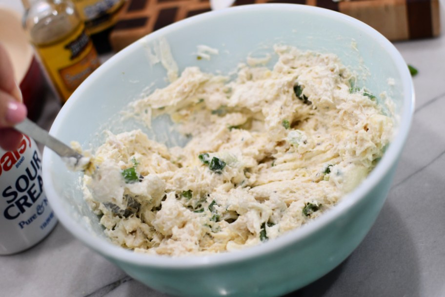 stirring ingredients for crab rangoon dip