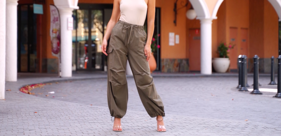 woman wearing parachute pants 