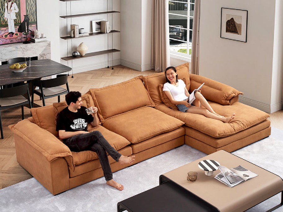 man and woman sitting on a 25home Sandwich Sectional