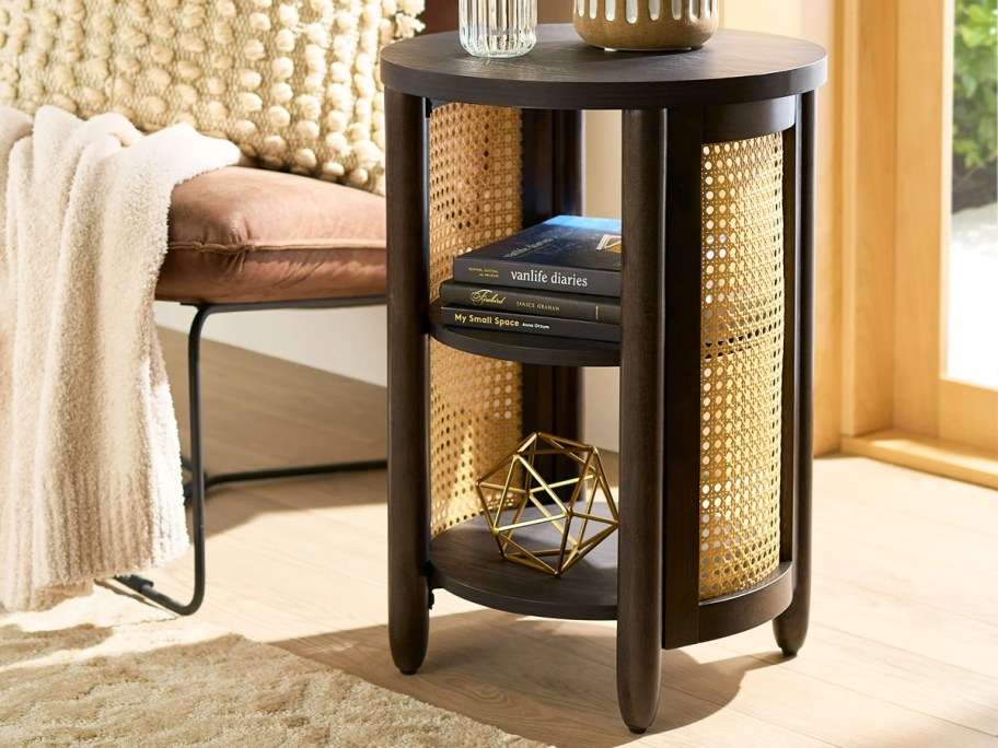 cane side table next to sofa