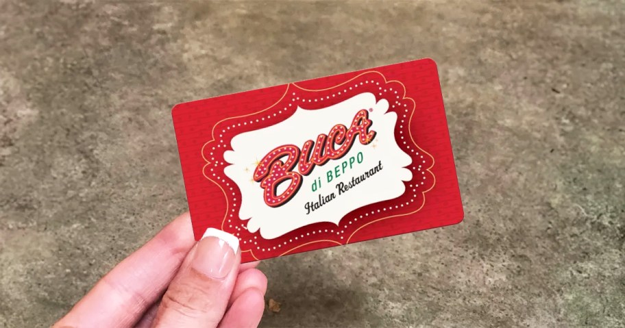 hand holding up a red Buca di Beppo gift card